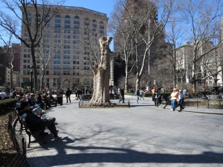 The activity from the Shake Shack spreads out into Madison Square Park as people enjoy their spoils.